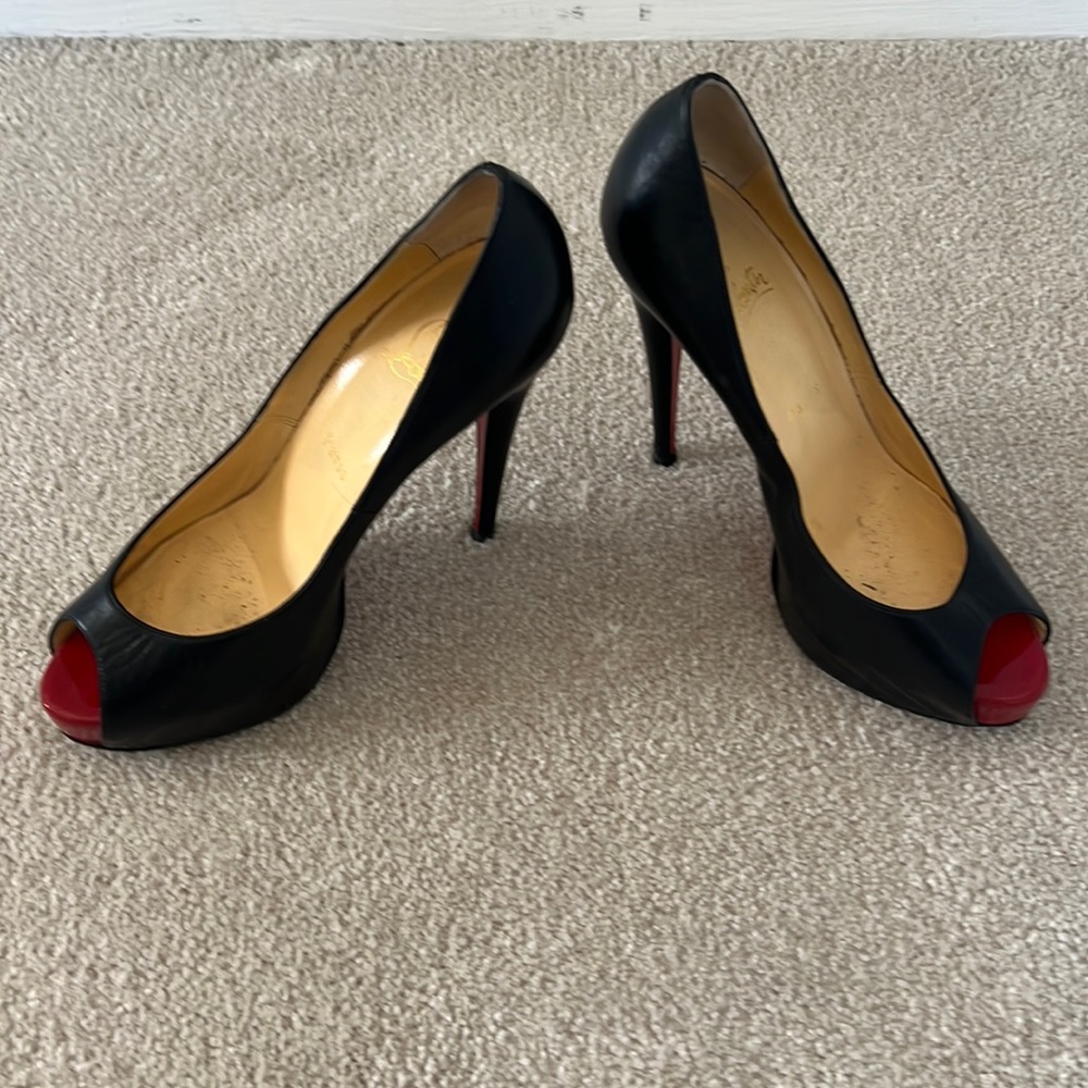 Louboutin peeptoe black pumps